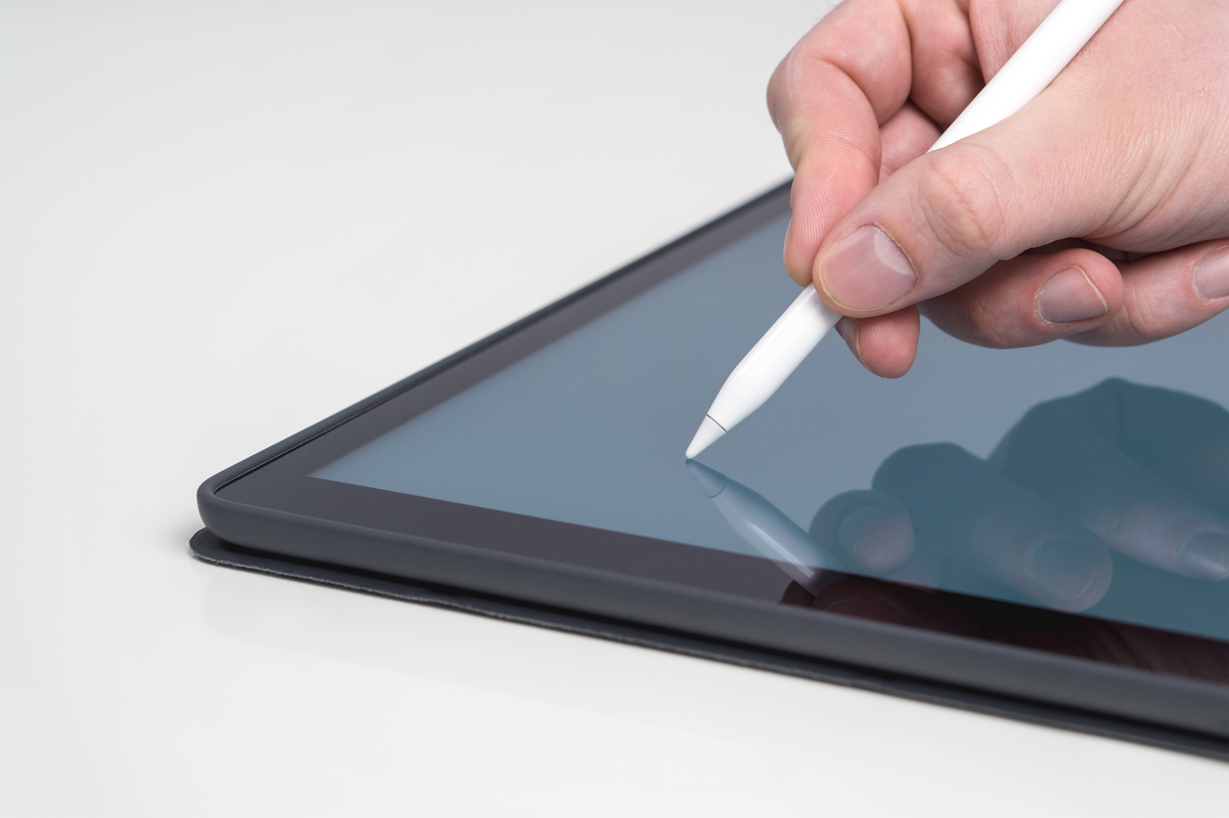 Nurse using tablet for clinical documentation